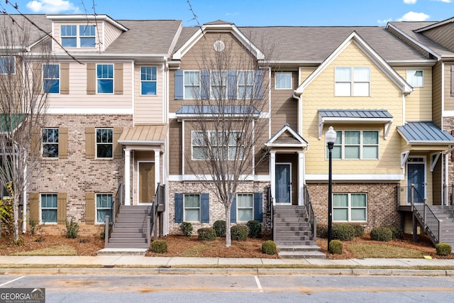 4192 Integrity Way, Powder Springs, GA 30127 - multi unit property featuring brick siding, stairway, and a standing seam roof
