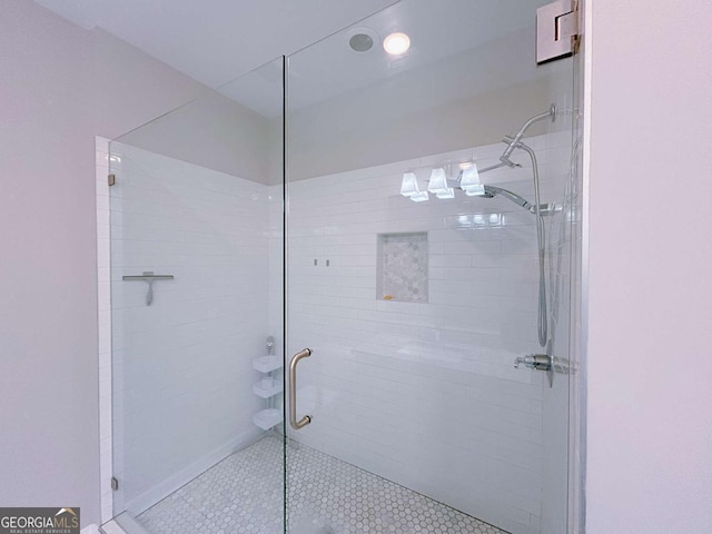 bathroom featuring an enclosed shower