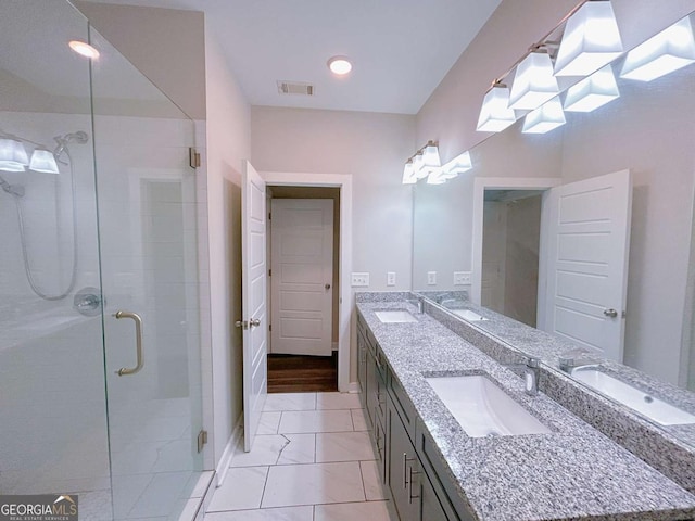 bathroom with hardwood / wood-style floors, vanity, and walk in shower