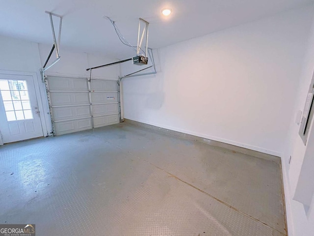 garage featuring a garage door opener