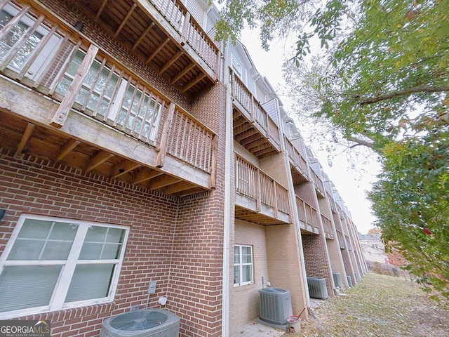 view of property featuring central AC unit