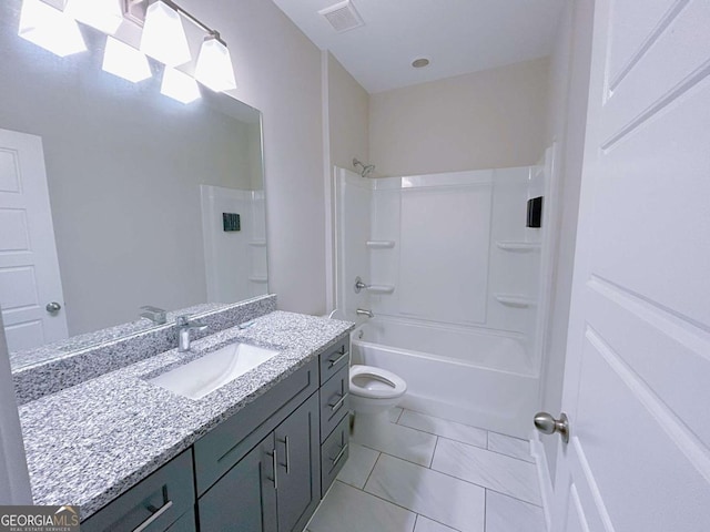 full bathroom with shower / washtub combination, tile patterned flooring, vanity, and toilet