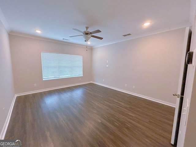 unfurnished room with dark hardwood / wood-style floors, ceiling fan, and crown molding