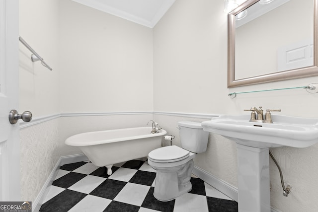 bathroom featuring toilet, ornamental molding, and a bath