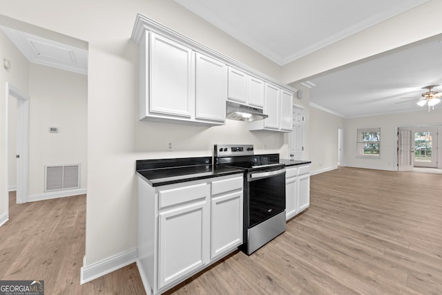 kitchen featuring white cabinets, crown molding, stainless steel range with electric cooktop, and light hardwood / wood-style floors