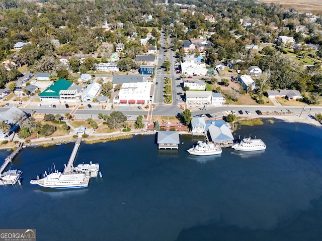 drone / aerial view with a water view