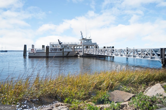 dock area featuring a water view