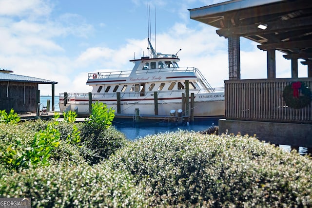 view of dock with a water view