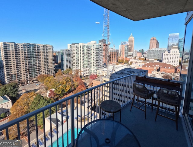 balcony featuring a view of city