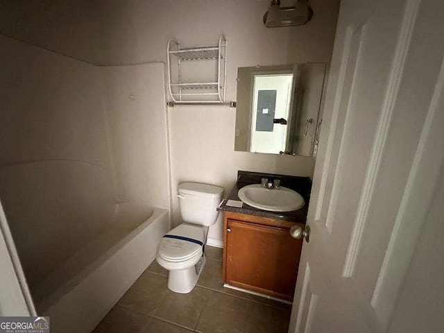 full bathroom featuring tile patterned flooring, electric panel, toilet, shower / tub combination, and vanity