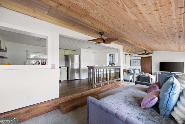 living room with lofted ceiling, ceiling fan, dark wood-type flooring, and wood ceiling