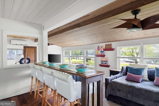 dining room featuring ornamental molding, wood ceiling, vaulted ceiling, wood-type flooring, and an AC wall unit