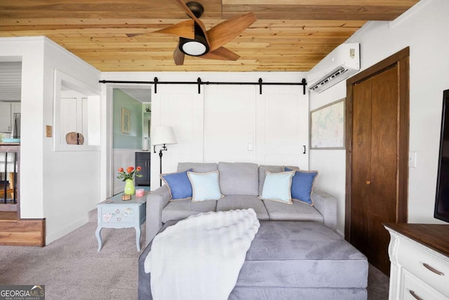 carpeted living room with a barn door, a wall unit AC, ceiling fan, and wood ceiling