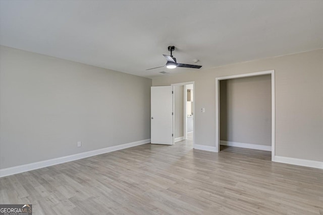 unfurnished bedroom featuring light hardwood / wood-style floors and ceiling fan