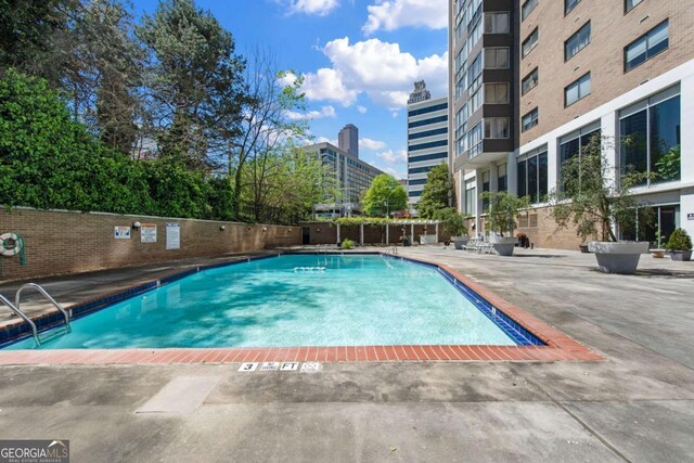 view of pool with a patio area