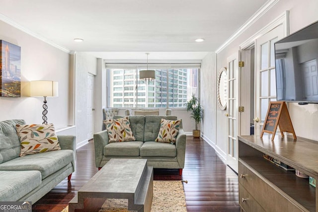 living room featuring dark hardwood / wood-style floors and ornamental molding