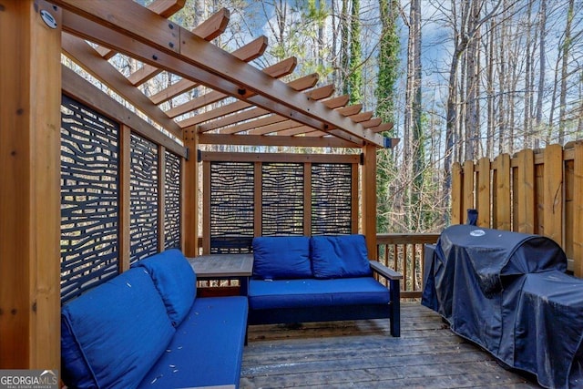 wooden terrace featuring an outdoor hangout area, a pergola, and a grill