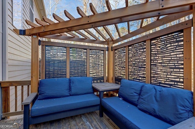 wooden deck featuring a pergola and outdoor lounge area