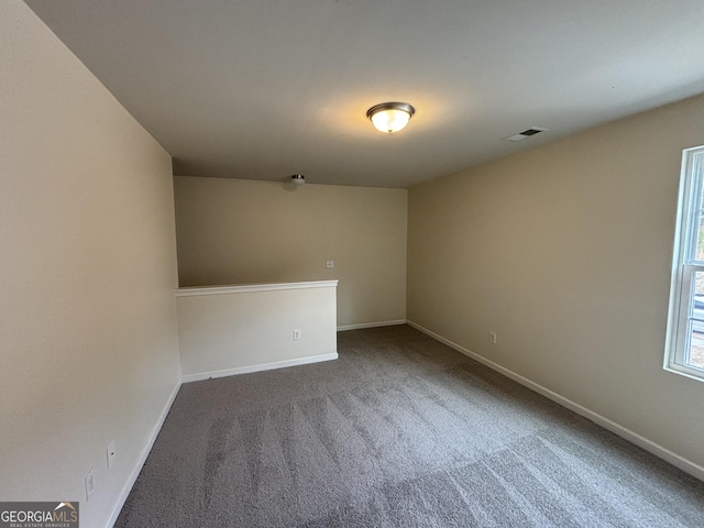 view of carpeted spare room