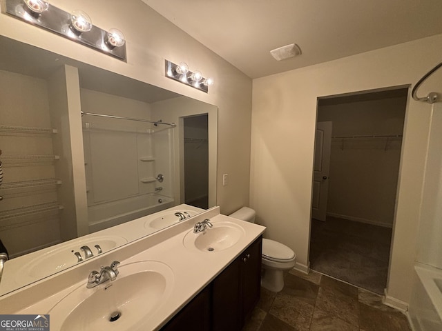 full bathroom with toilet, vanity, and shower / bathtub combination