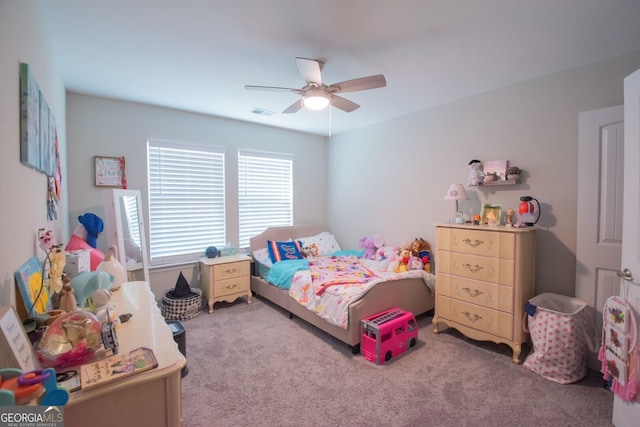 carpeted bedroom with ceiling fan