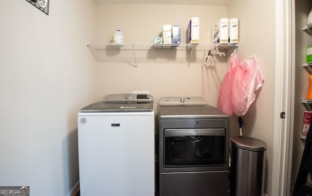 laundry area featuring separate washer and dryer