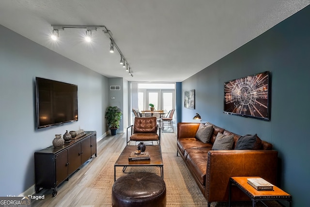 living room featuring light hardwood / wood-style floors