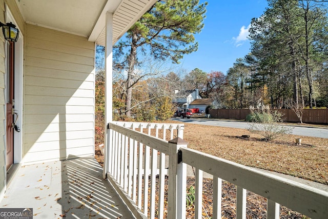 balcony featuring a porch