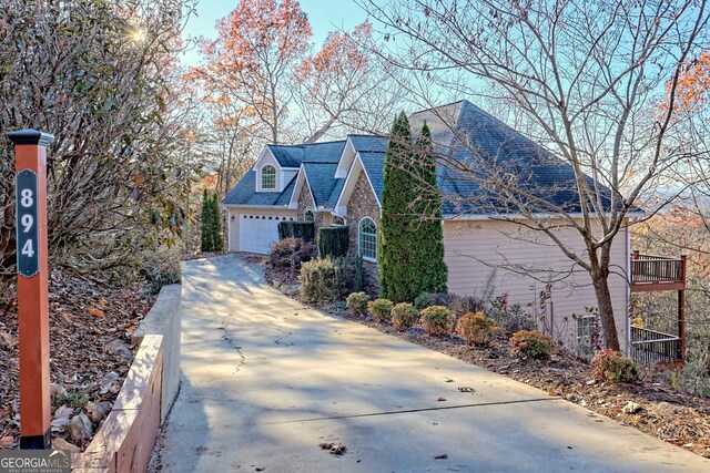 view of property exterior with a garage