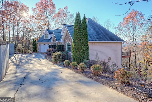 view of property exterior featuring a garage