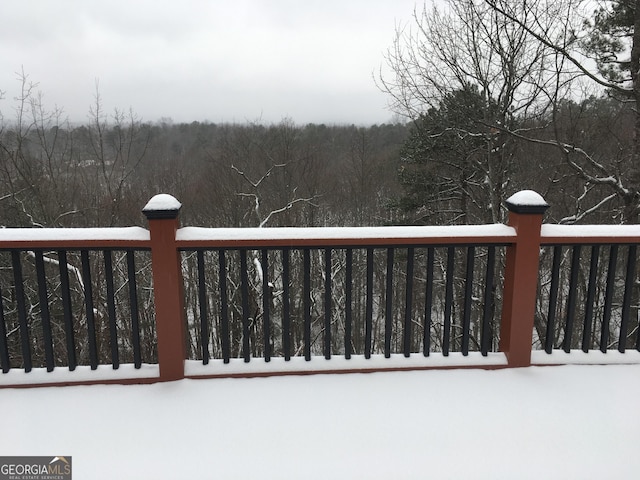 view of snow covered deck