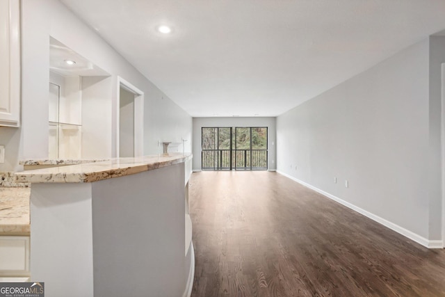 interior space with dark hardwood / wood-style floors