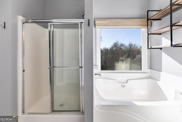 bathroom featuring walk in shower