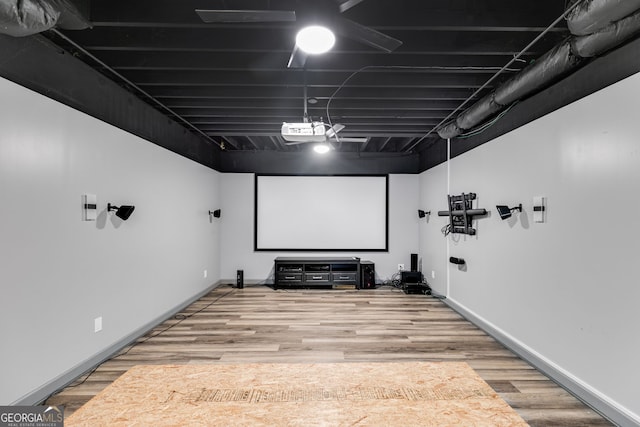 home theater featuring wood-type flooring