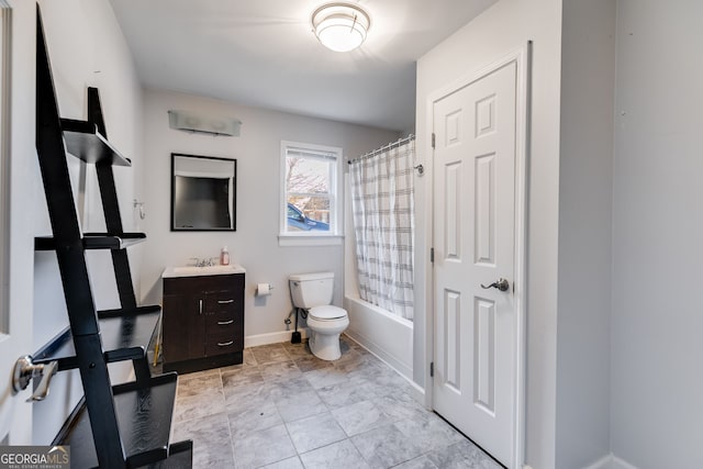 full bathroom with shower / bath combination with curtain, vanity, and toilet