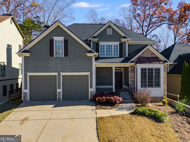 craftsman inspired home with a garage