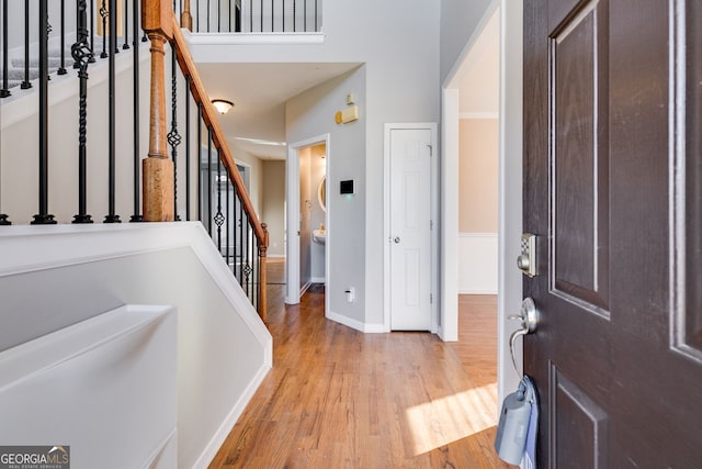 entryway with light hardwood / wood-style flooring