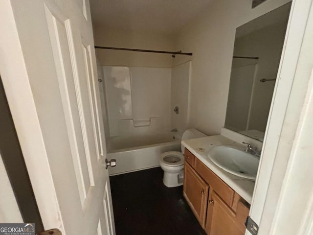 full bathroom featuring vanity, shower / bath combination, and toilet