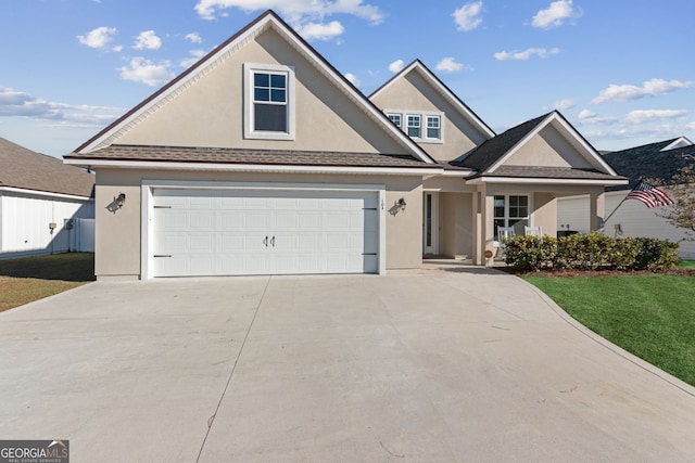 view of front of property featuring a garage