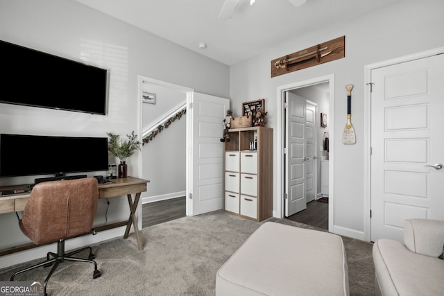 office with carpet and ceiling fan