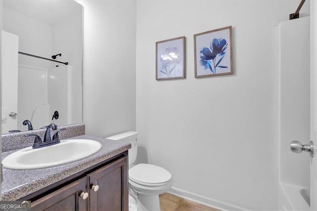 full bathroom featuring tile patterned floors, vanity, toilet, and tub / shower combination