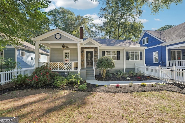 view of front of home featuring ceiling fan and covered porch