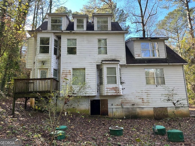 view of front of home with a wooden deck