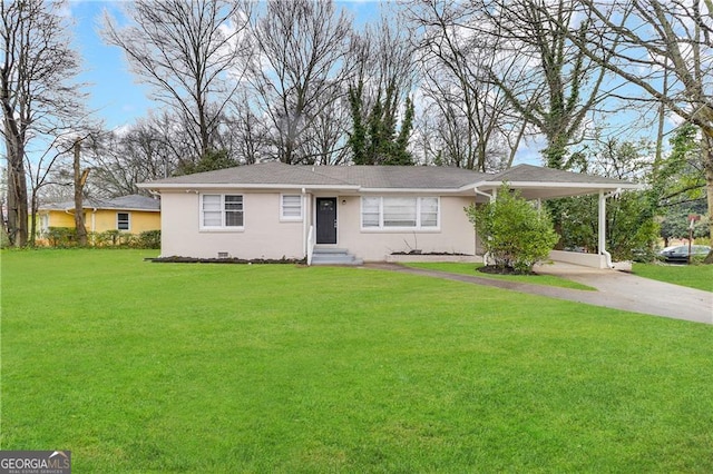 ranch-style home featuring a carport and a front lawn