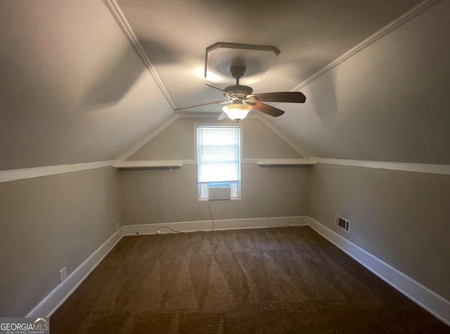 additional living space featuring ceiling fan, cooling unit, lofted ceiling, and dark carpet