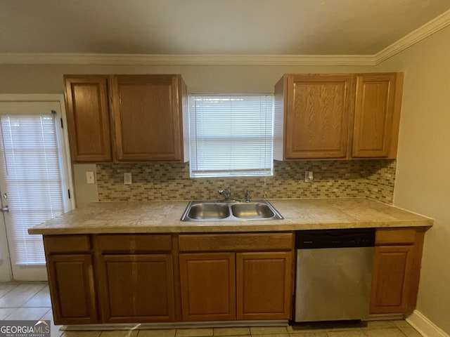 kitchen featuring dishwasher, crown molding, decorative backsplash, and sink