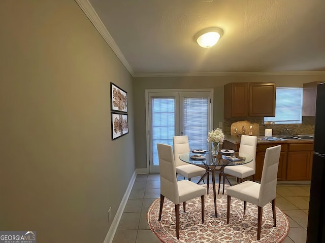 tiled dining space with ornamental molding