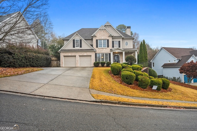 view of front of property featuring a garage