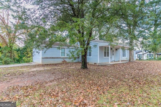 ranch-style home with covered porch