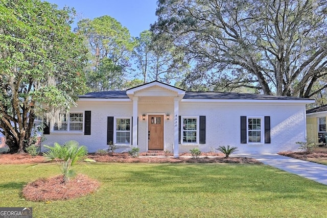 view of front of home with a front yard